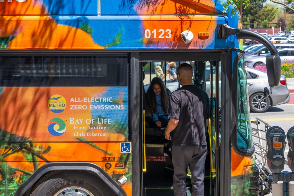 Person getting on bus